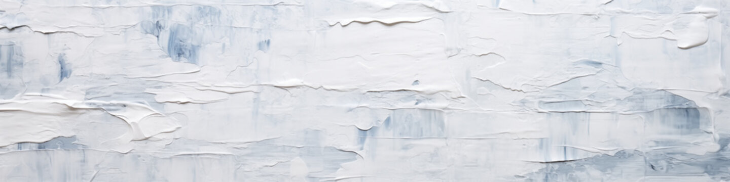 Abstract background based on careless brush strokes of chatel white paint on a blue wall.