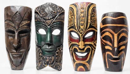 four traditional wooden african totem masks from nigeria isolated on white backround