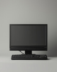 Tech Minimalism: Black Computer on Gray Surface
