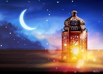 Ramadan Kareem Arabian Lantern on the blue night sky