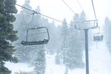 On a Ski lift during a snow storm