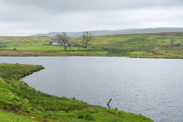 Haus am Loch Thom beim Greenock Cut im Clyde muirshiel regional park, bei Greenock, Inverclyde, Schottland