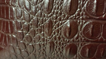 the texture of crocodile skin. beautiful brown material.