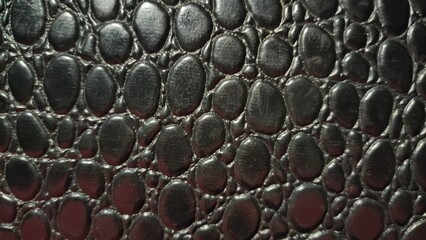 black textured background. close-up of the textural surface of the material.