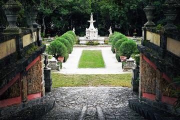 Fototapeta na wymiar A fountain in the gardens at the historic Vizcaya museum in Miami