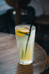 freshly made lemonade on the table in the cafe. Lemonade with ice was prepared in the summer cafe
