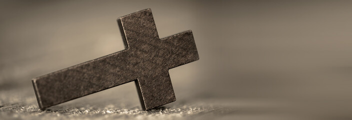 Wooden cross in table