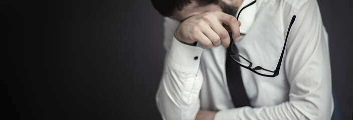 sad man in office desk