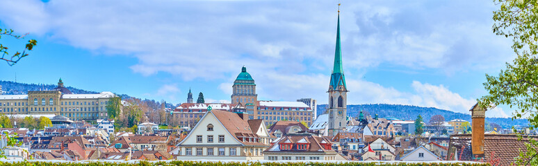 The roofs of Zürich with the spire of Predigerkirche church, Switzerland - obrazy, fototapety, plakaty