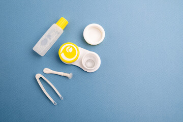 .Container for lenses and accessories on a light background. Health and medicine concept
