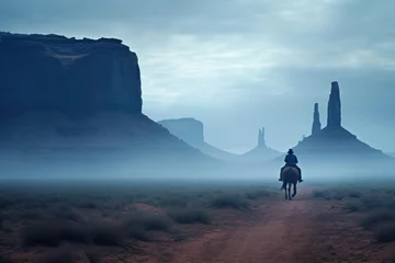 Schilderijen op glas Cowboy on horseback with landscape of American’s Wild West with desert sandstones. © Joyce