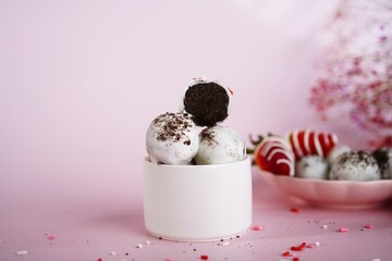 Homemade Cookie truffles or Balls coated in white chocolate, selective focus