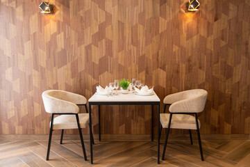 Table set up for two in a cafe, cafeteria, restaurant.