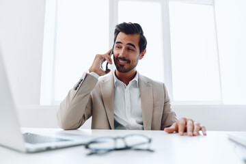 Fototapeta premium Man talk smile occupation caucasian computer phone winner happy office laptop businessman manager working