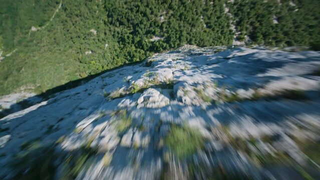 FPV drone diving Vercors mountains in French Alps