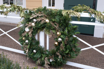 Christmas wreath on the door of the house