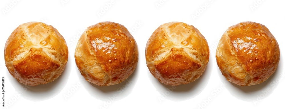 Poster a photo showing three loaves of bread lined up in a row on a white background.