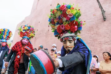 Papier Peint photo Carnaval Dancers of the Ancash region with their typical costumes in the parade in the historical center of Lima, Peru.