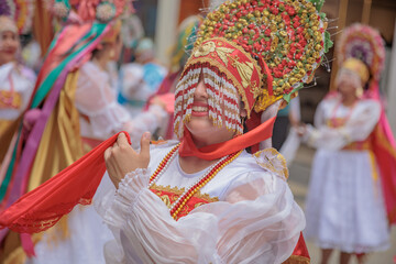 Dancers of the Ancash region with their typical costumes in the parade in the historical center of Lima, Peru.