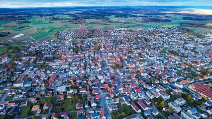 Aerial around the village Laichingen in Germany on a sunny afternoon in autumn	