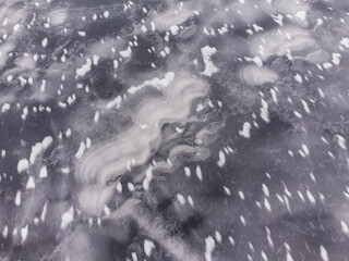 Frozen lake from above, during winter.