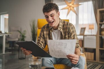 young caucasian man student study at home learn exam or prepare lesson