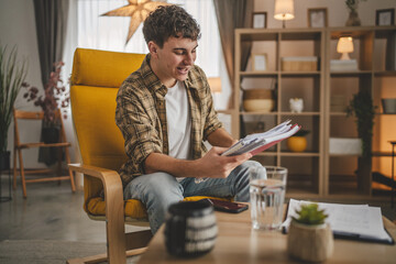 young caucasian man student study at home learn exam or prepare lesson