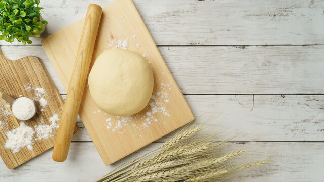 パンやお菓子の生地作り イメージ｜小麦粉の生地と麦穂