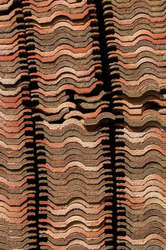 Background of a pile of roof tiles which creates an abstract texture