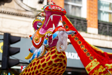 Dragon dance during Chinese lunar year celebrations in London, England