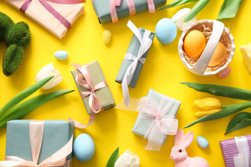 Easter eggs, tulip flowers with gift boxes and bunnies on yellow background