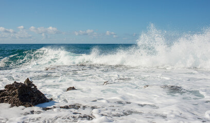 waves with foam on the coast of Turkey for postcard banner background