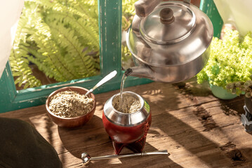 infusion of traditional Argentine yerba mate with hot water