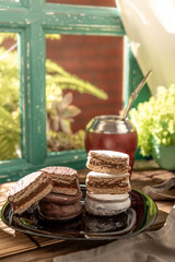 Argentine Alfajor with chocolate and meringue filled with dulce de leche
