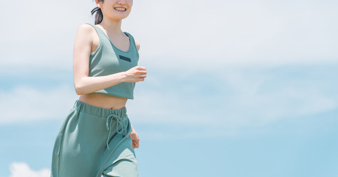 有酸素運動・ランニング・ジョギングする女性（ダイエット・新陳代謝）
