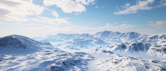 Fototapeta na wymiar Majestic Snow-Covered Mountains Against Clear Blue Sky