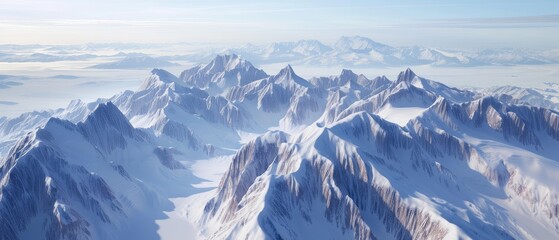 Fototapeta na wymiar Panoramic View of Snow-Covered Mountain Ranges