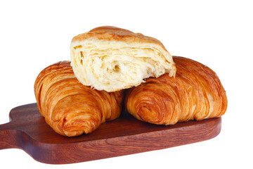 Crisp fresh croissants in the background