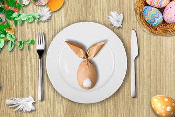 Easter table concept.Art Easter bunny  and egg. Top view.
