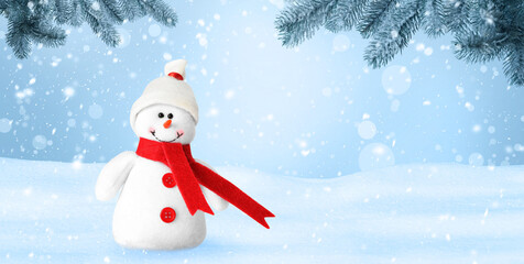Cute decorative snowman in hat and scarf outdoors on snowy day, space for text. Banner design