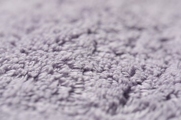 Texture of soft violet fabric as background, closeup