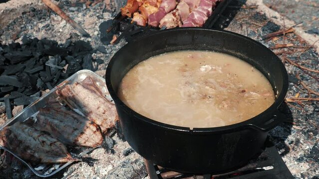 Kulish prepared on fire. BBQ time. Picnic time. Meat frying on fire