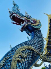Fototapeta na wymiar Thai style statue in the temple. Thai dragon statue in temple.