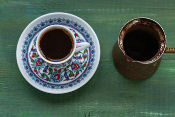 Coffee Pot (Cezve) and Turkish Coffee (Turk Kahvesi) in the Middle of Coffee Beans Photo, Uskudar Istanbul, Turkiye (Turkey)