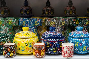 Fototapeta na wymiar Colorful Souvenirs in the Touristic Travel Destinations Grand Bazaar. Ceramics, Mosaic, Porcelain, Coffee Cups and Mosaic Lamps Photo, Grand Bazaar Fatih, Istanbul Turkiye (Turkey)