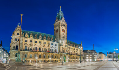 Fototapeta na wymiar Hamburg Germany, night panorama city skyline at Rathaus City Hall Square