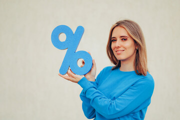 Happy Woman Holding a Sale Sign Announcing big Discounts. Promoter girl holding the symbol of big...