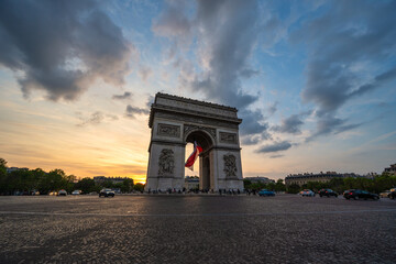 Naklejka premium Paris France, city skyline sunset at Arc de Triomphe and Champs Elysees