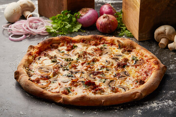 Italian Stallion Pizza topping with onion, mushroom and coriander isolated on dark background with raw food top view of italian fastfood appetizer