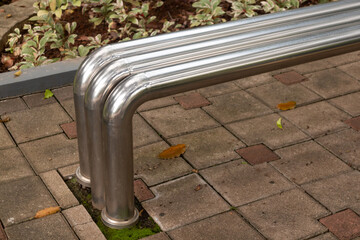Close up view of A stainless steel bench in the garden
